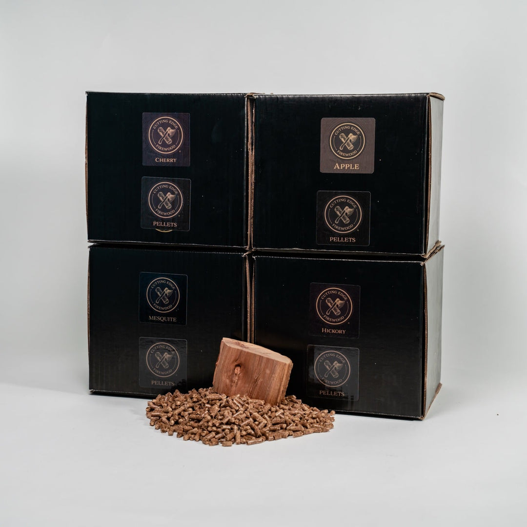 Four black boxes with a logo on a white background, one box open showing wood pellets.