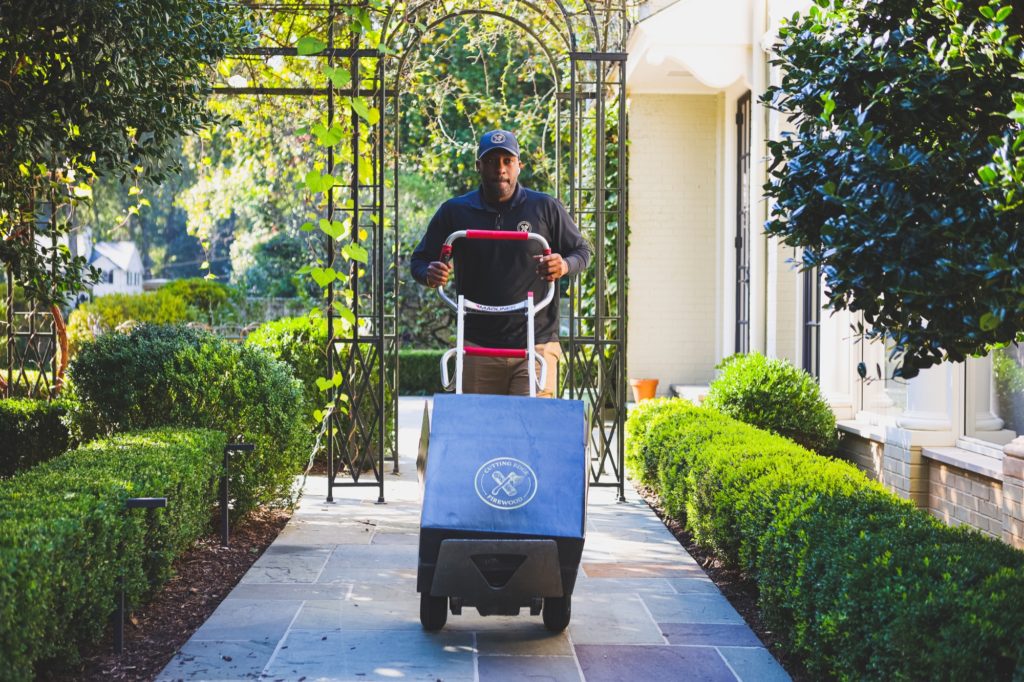 delivery artisan delivering firewood box